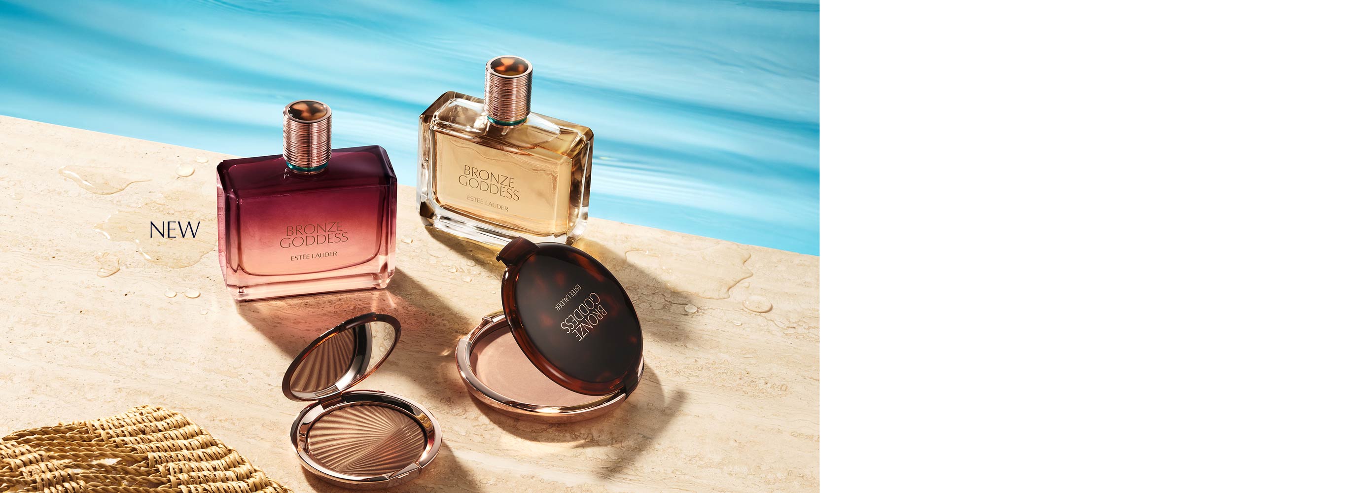 The Bronze Goddess Fragrance Collection with two bottles in the background and bronzer palettes in the foreground. The image has a background of the products sitting on the beach with the ocean in the background.